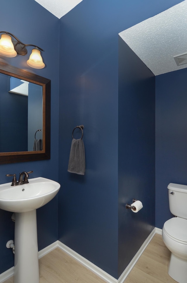 8397 Norwood Ln N, Maple Grove, MN 55311 - bathroom featuring wood finished floors