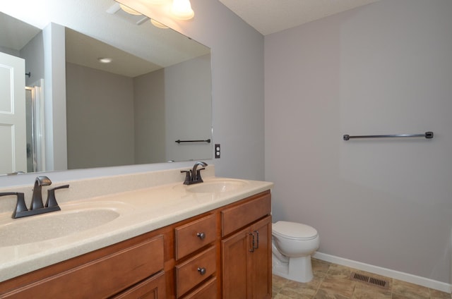 8397 Norwood Ln N, Maple Grove, MN 55311 - bathroom featuring double vanity and a shower with shower door