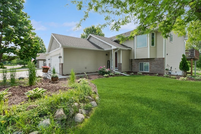 409 Birch Ave NW, Saint Michael, MN 55376 - tri-level home featuring an attached garage, brick siding, and a front lawn