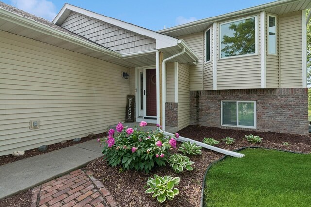 409 Birch Ave NW, Saint Michael, MN 55376 - doorway to property with brick siding