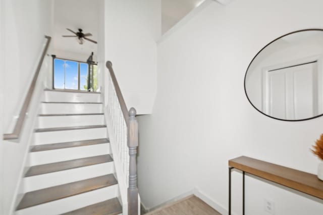 409 Birch Ave NW, Saint Michael, MN 55376 - stairs featuring a ceiling fan and wood finished floors