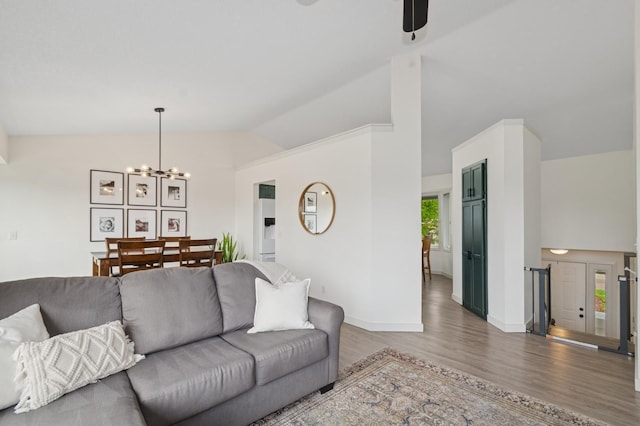 409 Birch Ave NW, Saint Michael, MN 55376 - living area with wood finished floors, a chandelier, and high vaulted ceiling