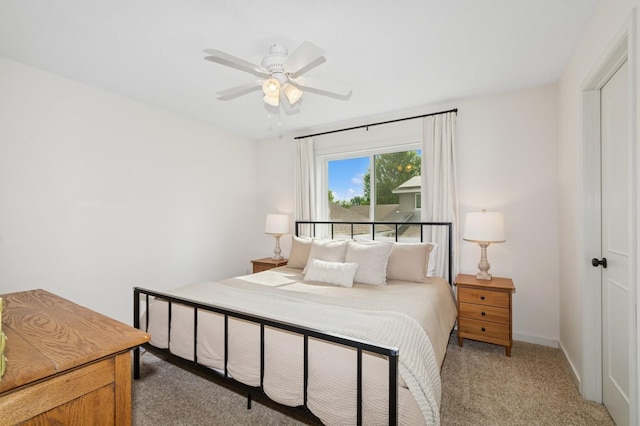 409 Birch Ave NW, Saint Michael, MN 55376 - bedroom featuring light carpet and a ceiling fan