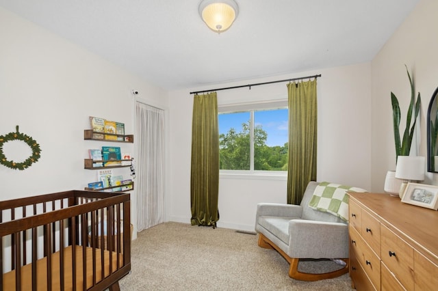 409 Birch Ave NW, Saint Michael, MN 55376 - bedroom featuring light carpet and a crib