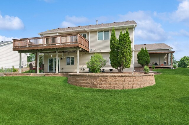 409 Birch Ave NW, Saint Michael, MN 55376 - rear view of property featuring a deck and a lawn