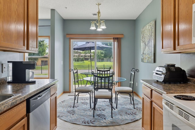 7308 Unity Ln N, Brooklyn Park, MN 55443 - kitchen featuring dishwasher, a chandelier, light carpet, hanging light fixtures, and dark countertops