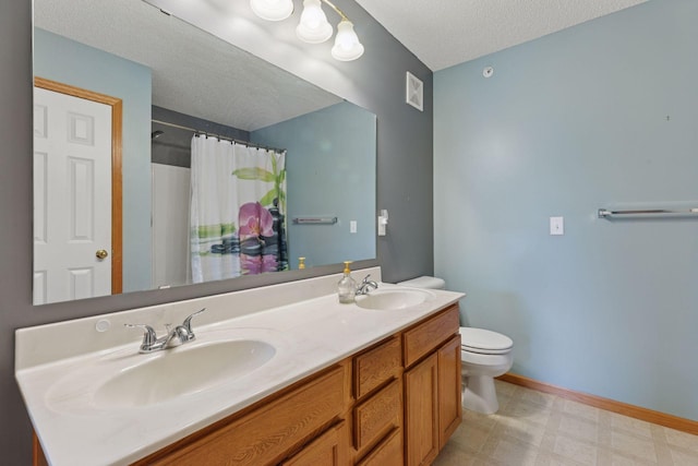 7308 Unity Ln N, Brooklyn Park, MN 55443 - bathroom with tile patterned floors, double vanity, a shower with curtain, and a textured ceiling