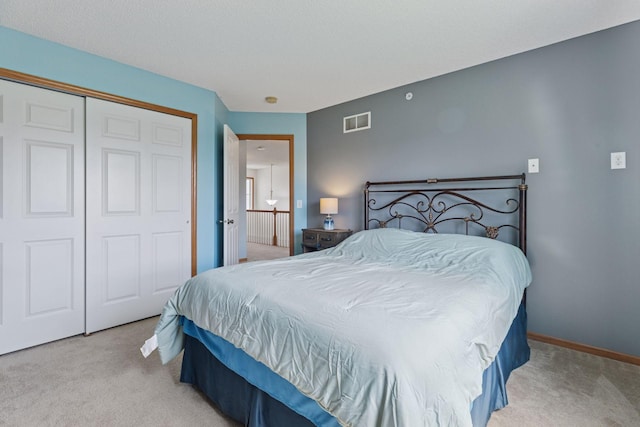 7308 Unity Ln N, Brooklyn Park, MN 55443 - bedroom featuring light carpet and a closet