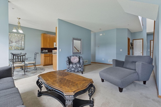 7308 Unity Ln N, Brooklyn Park, MN 55443 - living room featuring light carpet and a textured ceiling