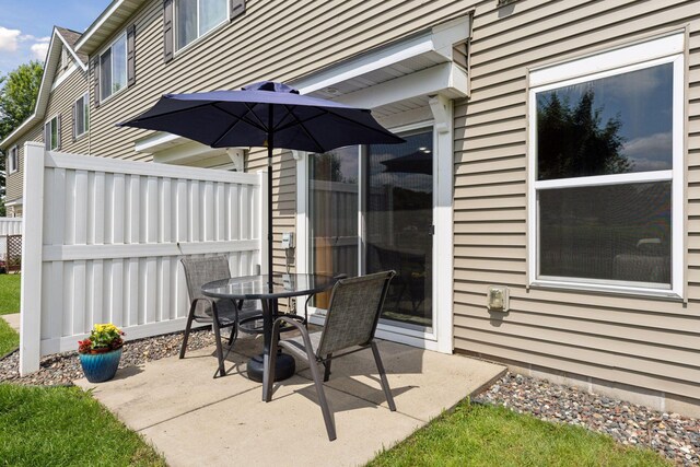 7308 Unity Ln N, Brooklyn Park, MN 55443 - view of patio / terrace featuring outdoor dining area