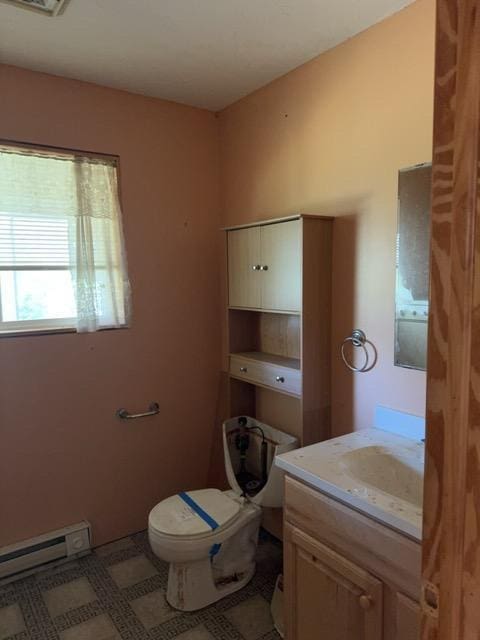 7300 County Road 8 NE, Longville, MN 56655 - bathroom with a baseboard heating unit and vanity