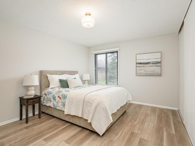 1181 Yuma Ln N, Plymouth, MN 55447 - bedroom with light wood-style flooring and baseboards