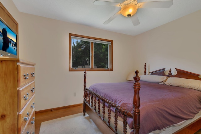 104 9th Ave N, Sartell, MN 56377 - bedroom featuring wood finished floors and ceiling fan