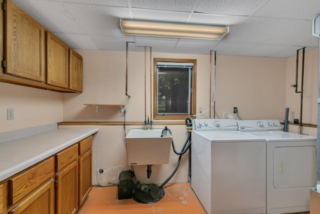 104 9th Ave N, Sartell, MN 56377 - laundry room featuring cabinet space and separate washer and dryer
