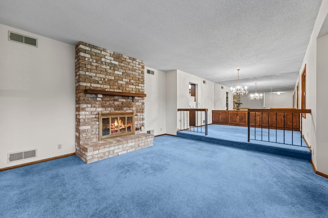 1267 Nursery Hill Ln, Arden Hills, MN 55112 - unfurnished living room featuring a chandelier, carpet, a textured ceiling, and a fireplace