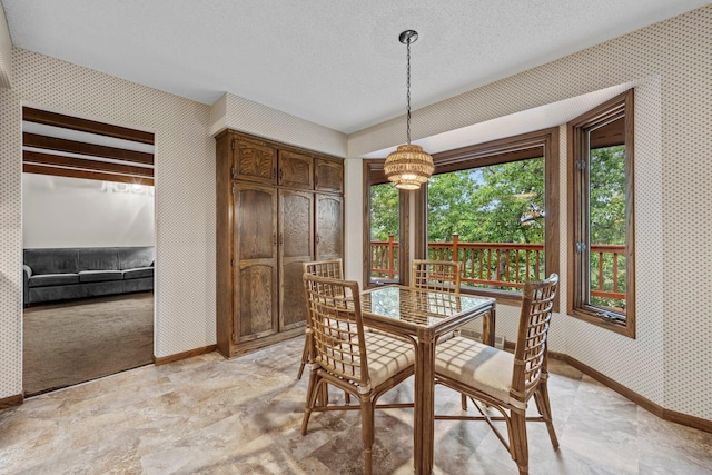 1267 Nursery Hill Ln, Arden Hills, MN 55112 - dining room with wallpapered walls and a chandelier