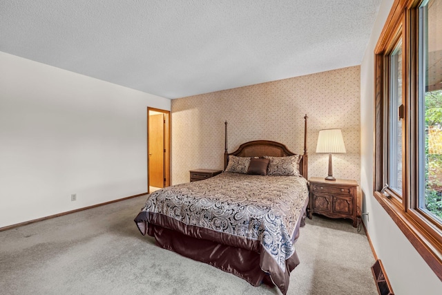 1267 Nursery Hill Ln, Arden Hills, MN 55112 - carpeted bedroom featuring a textured ceiling and wallpapered walls