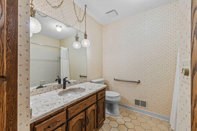 1267 Nursery Hill Ln, Arden Hills, MN 55112 - full bathroom with vanity, tile patterned floors, wallpapered walls, a shower with shower curtain, and a textured ceiling