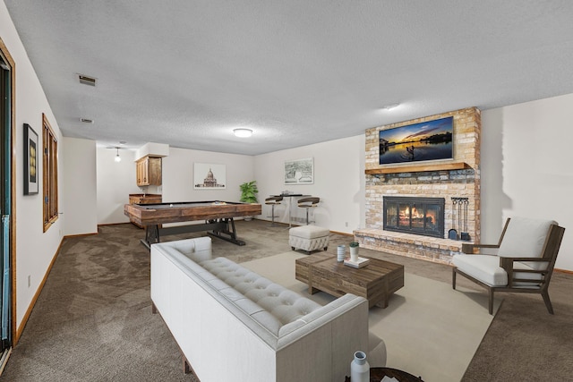 1267 Nursery Hill Ln, Arden Hills, MN 55112 - carpeted living area featuring billiards, a textured ceiling, and a fireplace