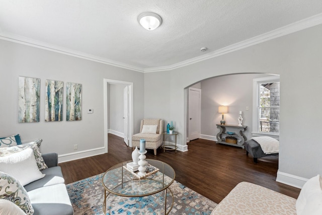 201 Genesee St, Saint Paul, MN 55117 - living room with arched walkways, crown molding, wood finished floors, and a textured ceiling