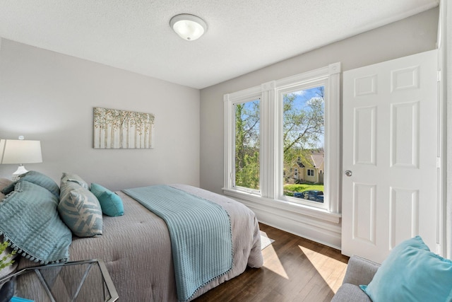 201 Genesee St, Saint Paul, MN 55117 - bedroom with dark wood finished floors