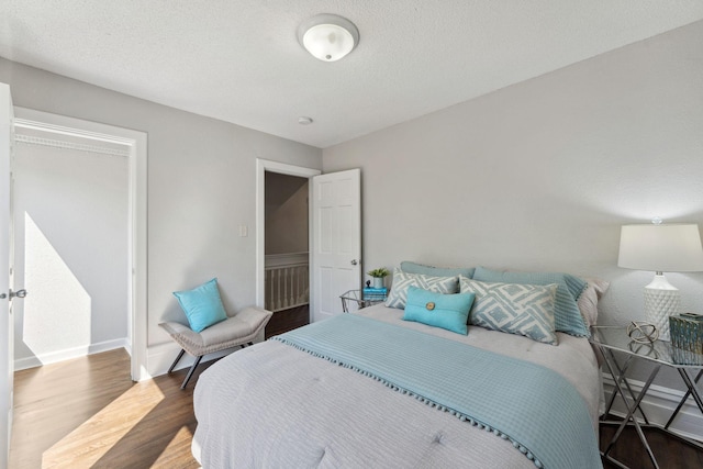 201 Genesee St, Saint Paul, MN 55117 - bedroom featuring wood finished floors and baseboards
