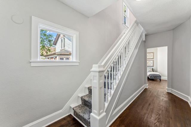 201 Genesee St, Saint Paul, MN 55117 - staircase with wood finished floors and baseboards