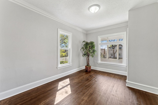 201 Genesee St, Saint Paul, MN 55117 - unfurnished room with healthy amount of natural light, wood-type flooring, a textured ceiling, and crown molding