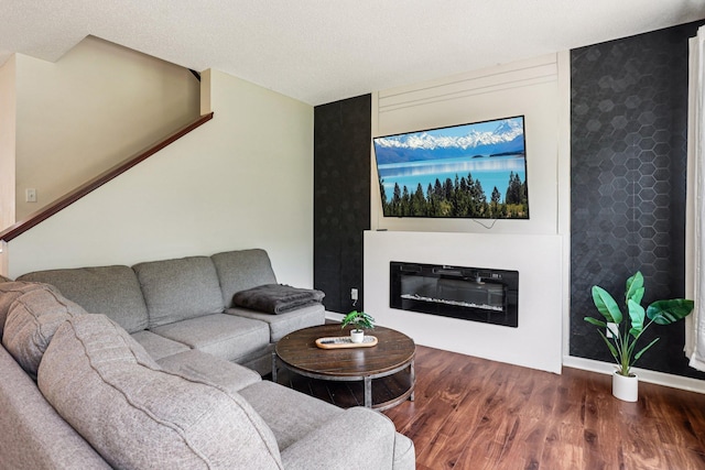 8257 Norwood Ln N, Maple Grove, MN 55369 - living room with wood finished floors and a glass covered fireplace