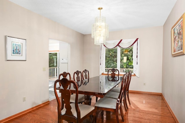 9035 Briarglen Rd, Eden Prairie, MN 55347 - dining space with a chandelier and light wood-type flooring