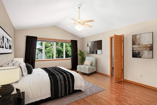 9035 Briarglen Rd, Eden Prairie, MN 55347 - bedroom featuring light wood finished floors, lofted ceiling, and a ceiling fan
