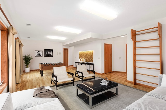 9035 Briarglen Rd, Eden Prairie, MN 55347 - living room featuring light wood finished floors and baseboards