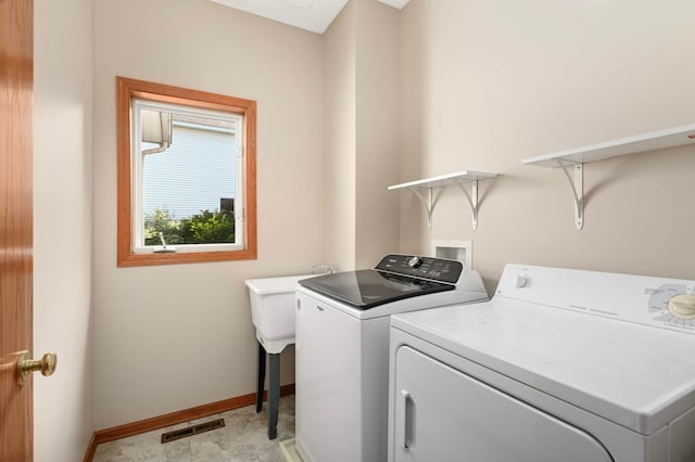 9035 Briarglen Rd, Eden Prairie, MN 55347 - laundry room featuring independent washer and dryer and baseboards