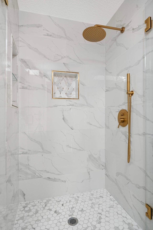 9035 Briarglen Rd, Eden Prairie, MN 55347 - full bath with a marble finish shower and a textured ceiling