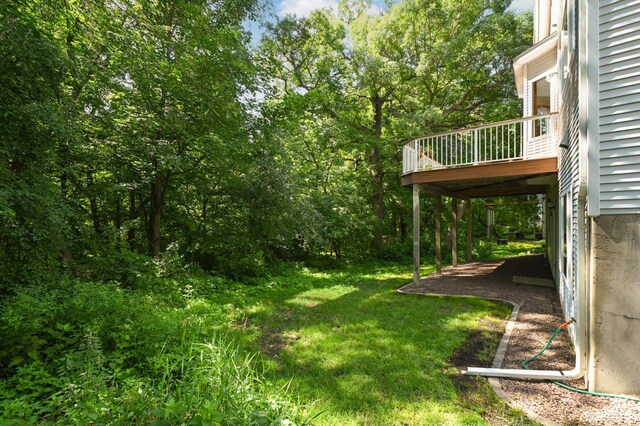 9035 Briarglen Rd, Eden Prairie, MN 55347 - view of grassy yard with a wooden deck