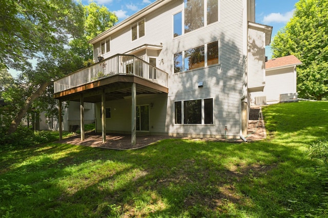 9035 Briarglen Rd, Eden Prairie, MN 55347 - back of property featuring a lawn and a deck