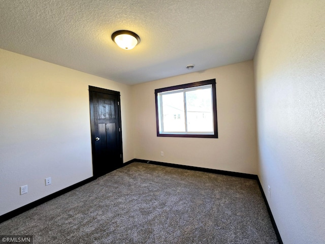 2101 Nelson St, Saint Peter, MN 56082 - unfurnished bedroom with carpet, a textured ceiling, and a closet