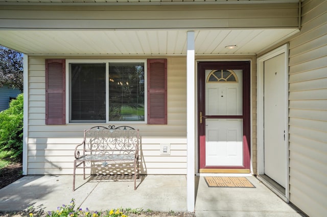 728 Elm St, Belle Plaine, MN 56011 - property entrance featuring covered porch