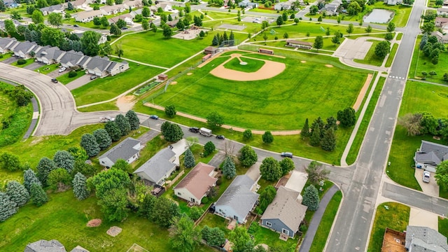 728 Elm St, Belle Plaine, MN 56011 - aerial perspective of suburban area