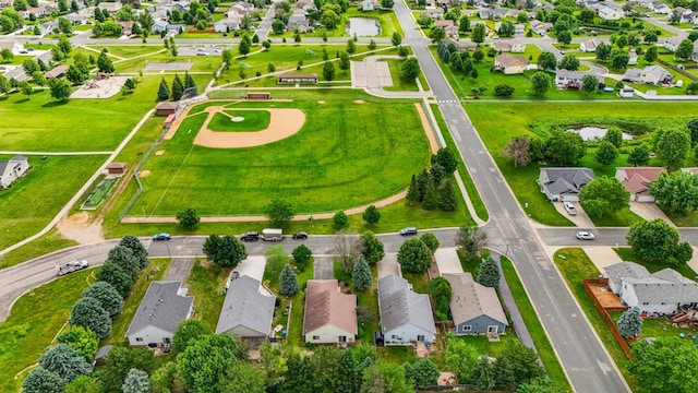 728 Elm St, Belle Plaine, MN 56011 - aerial perspective of suburban area