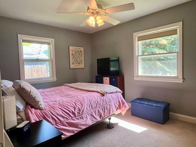 8412 4th Ave S, Bloomington, MN 55420 - carpeted bedroom with multiple windows and a ceiling fan
