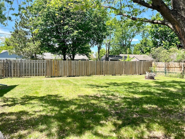 8412 4th Ave S, Bloomington, MN 55420 - fenced backyard featuring a fire pit