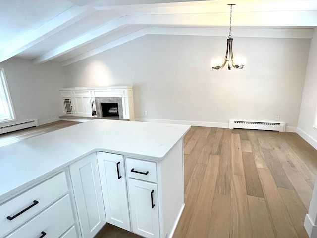 2611 Kyle Ave N, Golden Valley, MN 55422 - kitchen featuring baseboard heating, open floor plan, and light wood-type flooring