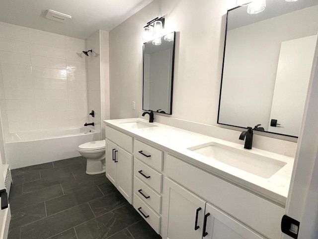 2611 Kyle Ave N, Golden Valley, MN 55422 - bathroom featuring double vanity and shower / washtub combination