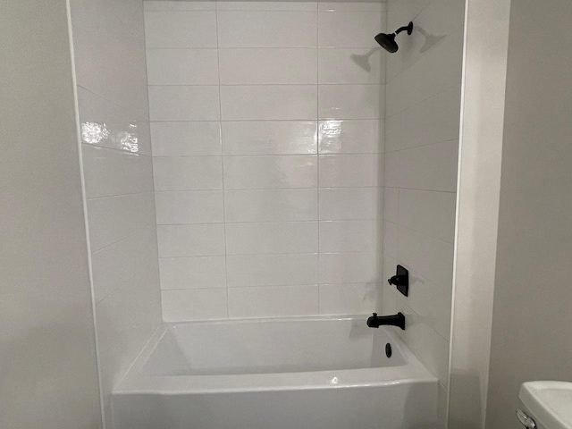 2611 Kyle Ave N, Golden Valley, MN 55422 - bathroom featuring toilet and washtub / shower combination