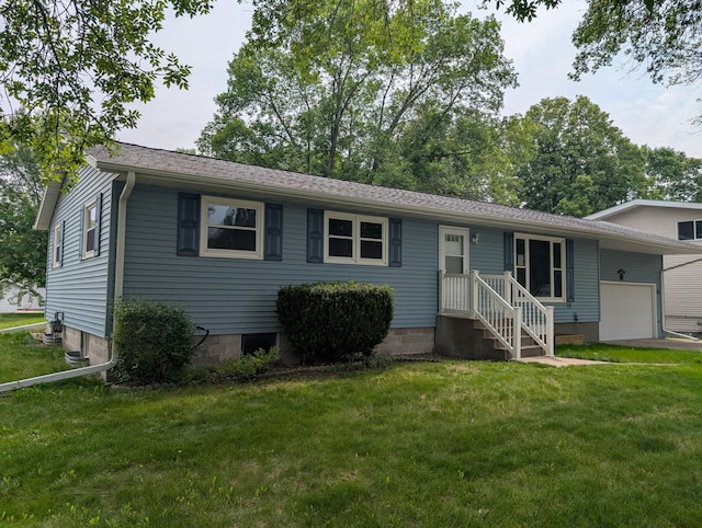 507 1st St, Marshall, MN 56258 - view of front of house featuring an attached garage and a front lawn