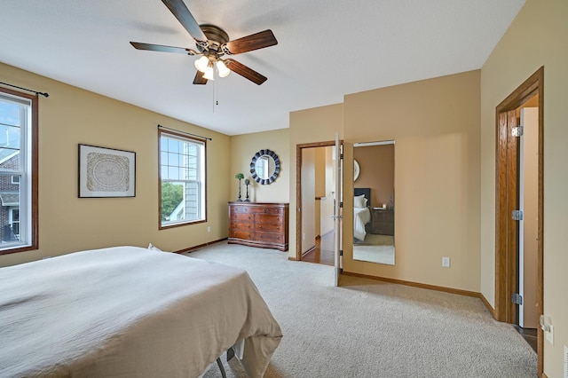 16618 72nd Ct NE, Otsego, MN 55330 - bedroom with light colored carpet and ceiling fan