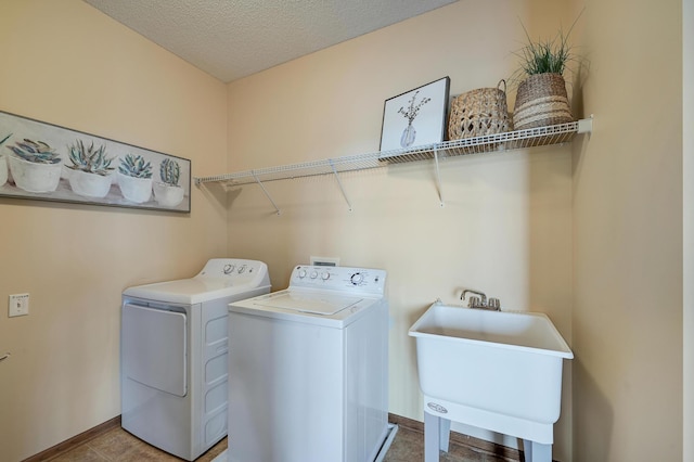 16618 72nd Ct NE, Otsego, MN 55330 - washroom featuring separate washer and dryer and a textured ceiling