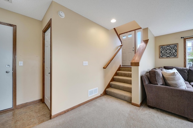 16618 72nd Ct NE, Otsego, MN 55330 - stairs with a textured ceiling and recessed lighting