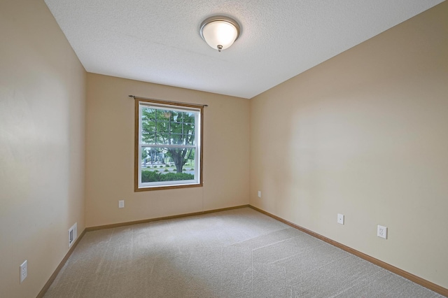 16618 72nd Ct NE, Otsego, MN 55330 - carpeted spare room with baseboards and a textured ceiling